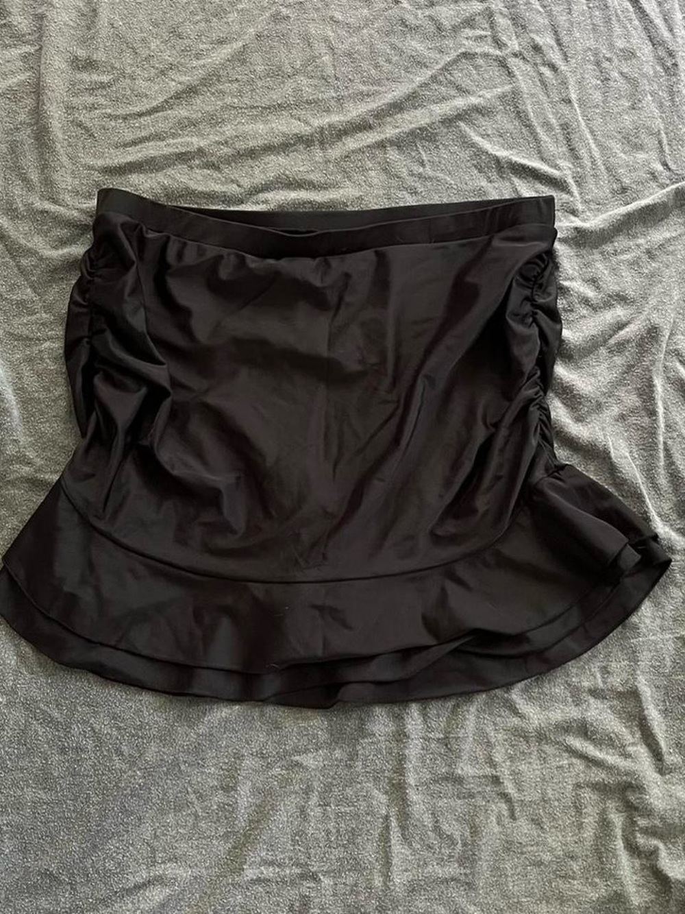 Women’s black swimsuit skirt bottoms